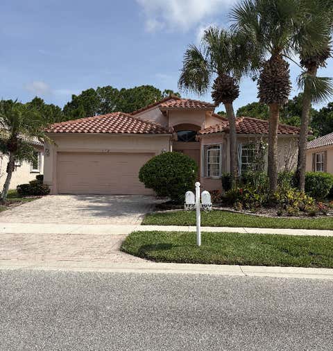 Photo of 172 NW LAWTON Road, Port Saint Lucie, FL 34986 (MLS # B26060610)