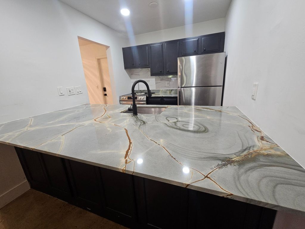 Photo of 825 NW 13th Street #110, Boca Raton, FL 33486 (MLS # B26018850)