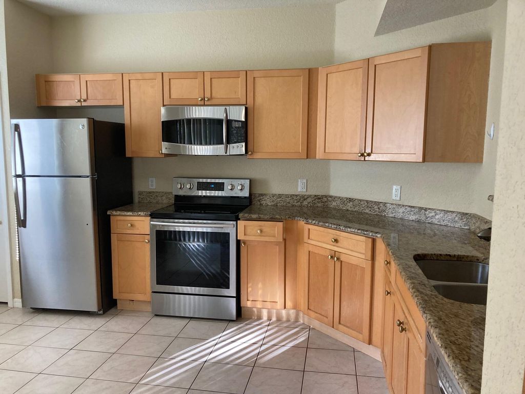 Photo of 11024 Legacy Drive #103, Palm Beach Gardens, FL 33410 (MLS # R11045903)