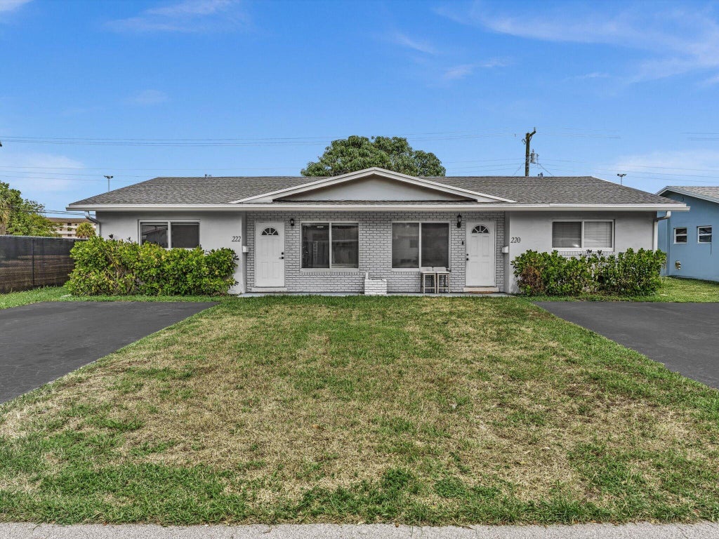 Photo of 222 NE 9th Avenue, Deerfield Beach, FL 33441 (MLS # B26073269)