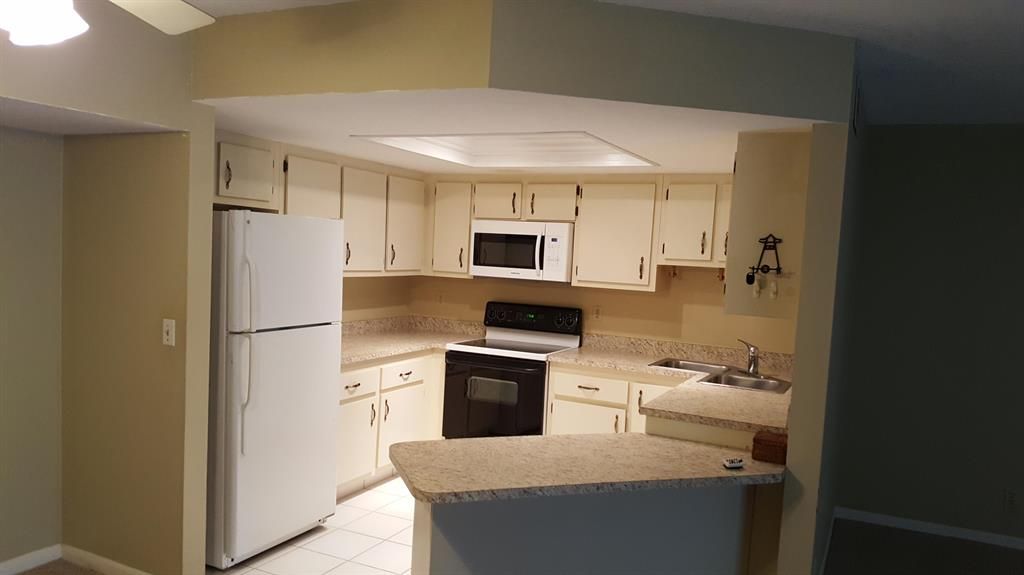 Photo of 6520 Chasewood Drive #B, Jupiter, FL 33458 (MLS # R10818217)