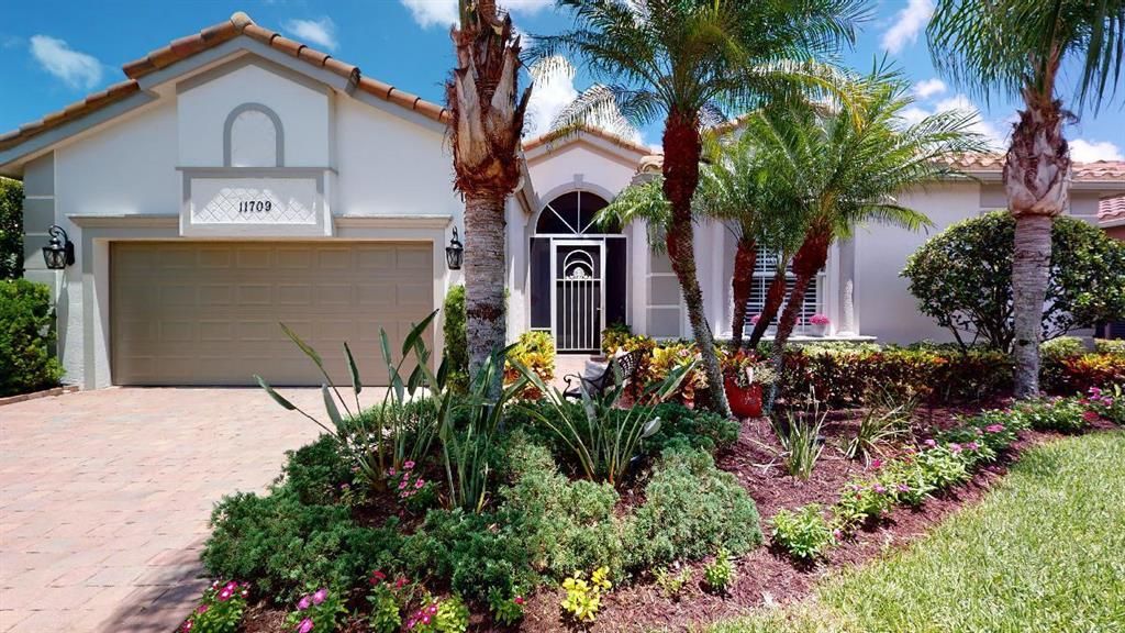 Photo of 11709 SW Apple Blossom Trail, Port Saint Lucie, FL 34987 (MLS # R10728824)