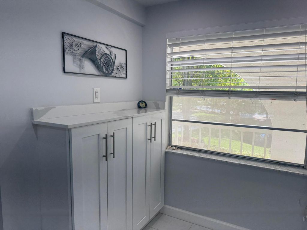 Photo of 4801 Martinique Place #B2, Coconut Creek, FL 33066 (MLS # B26008973)