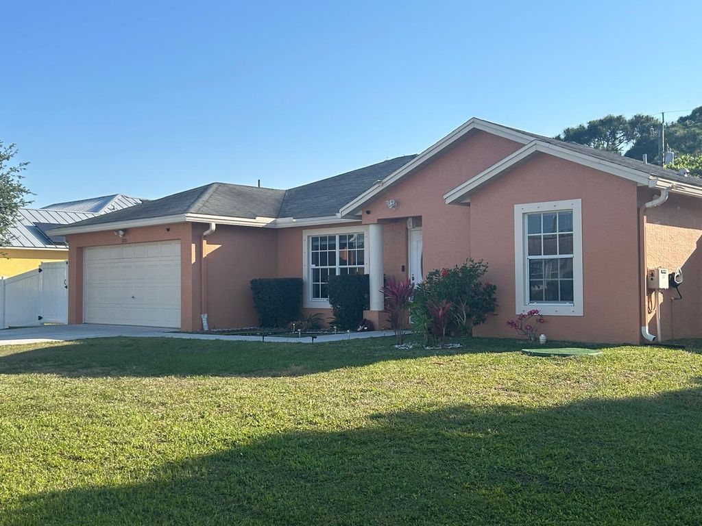 Photo of 2110 SW Larchmont Lane, Port Saint Lucie, FL 34984 (MLS # R11082222)