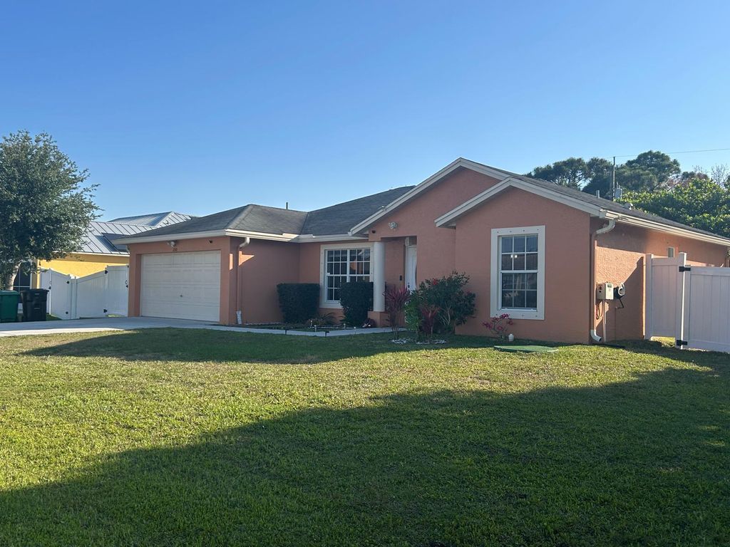 Photo of 2110 SW Larchmont Lane, Port Saint Lucie, FL 34984 (MLS # R11082222)