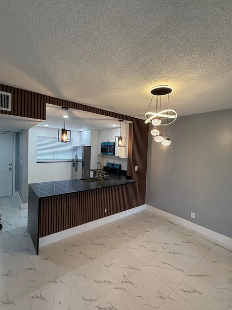 Photo of 1103 NW 58TH Terrace #317, Sunrise, FL 33313 (MLS # B26055433)