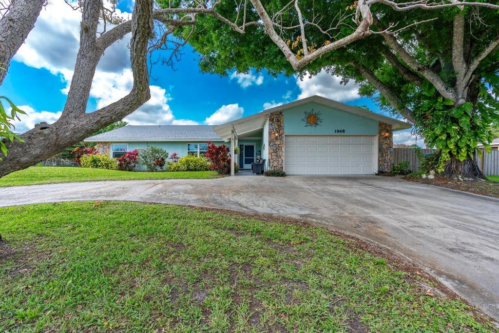 Photo of 1968 SW Aladdin Street, Port Saint Lucie, FL 34953 (MLS # R10969247)