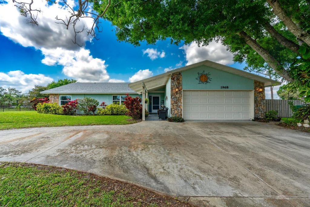 Photo of 1968 SW Aladdin Street, Port Saint Lucie, FL 34953 (MLS # R10969247)