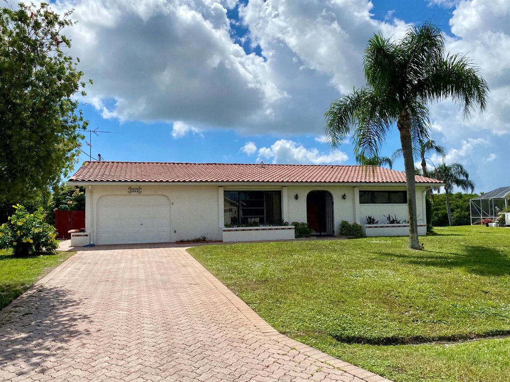 Photo of 1075 SE Coral Reef Street, Port Saint Lucie, FL 34983 (MLS # R11025176)