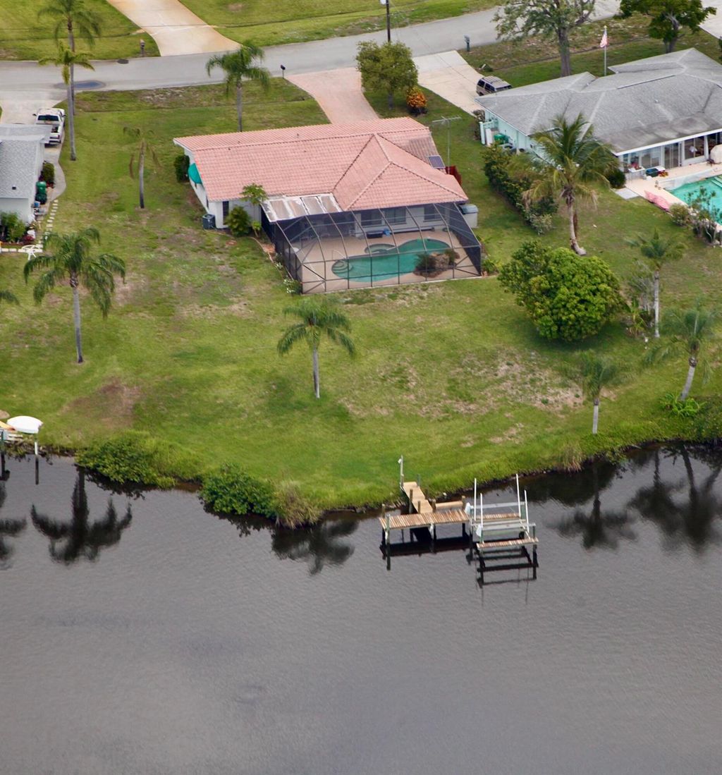 Photo of 1075 SE Coral Reef Street, Port Saint Lucie, FL 34983 (MLS # R11025176)