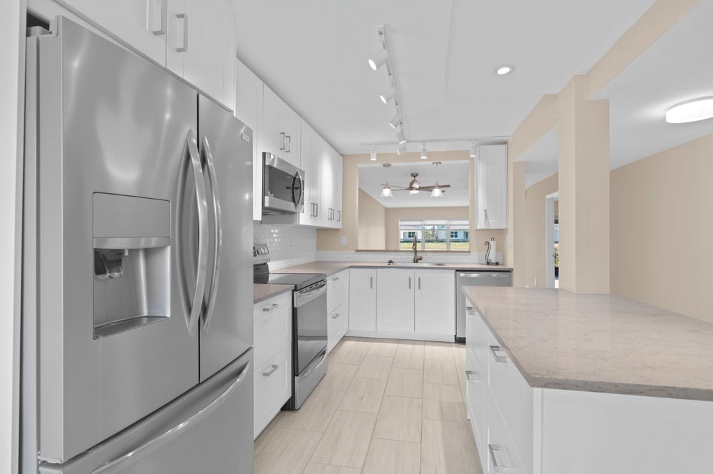 Photo of 5760 Princess Palm Court #B, Delray Beach, FL 33484 (MLS # R10986853)