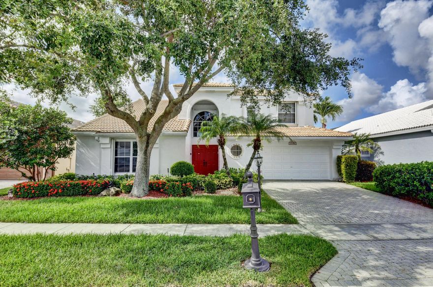 Amazing  home located in the desirable Costa del Sol  at Boca Pointe w/ 3 bdrm, 2.5 bath & fabulous water views of the Hillsboro Canal. Great eat-in kitchen w/ beautiful soft close wood cabinets, granite counters/backsplash & SS appliances. Large family room w/ sliders leading to patio and backyard. Spacious living rm and dining rm w/ incredible high ceilings, and wall of windows w/ spectacular views. Primary bedroom on main level. Beautiful Hardwood flooring thru-out first floor. The large 2 bdrms upstairs have a Jack & Jill bathroom.  Laundry room and direct entry 2 garage. make this home complete. Full Hurricane  Protection. Membership is optional if you are a golfer or tennis player. Located in ''A''rated school district in Boca Raton. Minutes to shopping, houses of worship and beaches