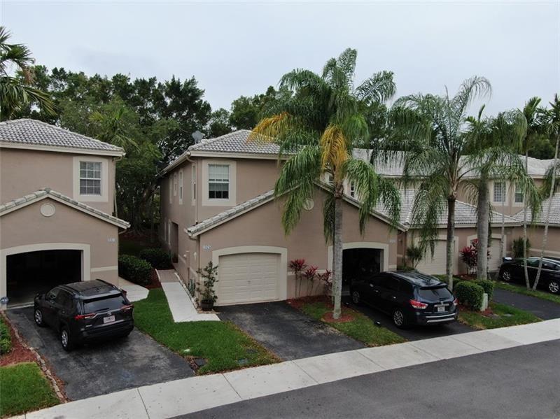 Spacious and well -maintained 4/2/1 townhouse in excellent location. Features beautiful laminated floors, a closed garage plus driveway parking for one vehicle. Located in area with A+ rated schools and quick access to major highways. The Community offers great amenities. Situated in the heart of Weston , close to shopping, dining and parks.