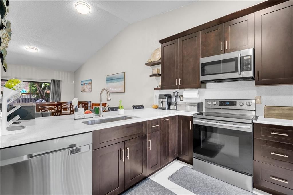 Photo of 1005 NW 53rd St St, Deerfield Beach, FL 33064 (MLS # F10342091)