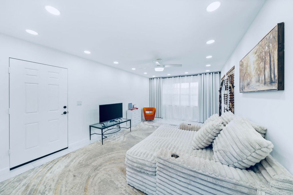 Photo of 129 Lake Carol Drive #129, West Palm Beach, FL 33411 (MLS # B26010210)