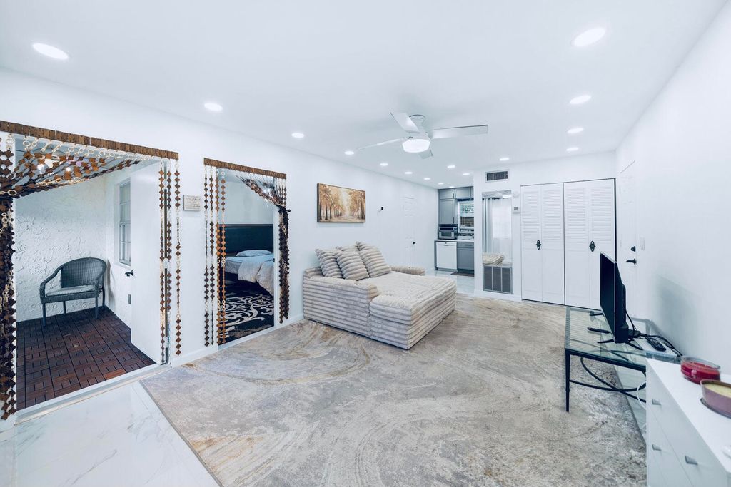 Photo of 129 Lake Carol Drive #129, West Palm Beach, FL 33411 (MLS # B26010210)