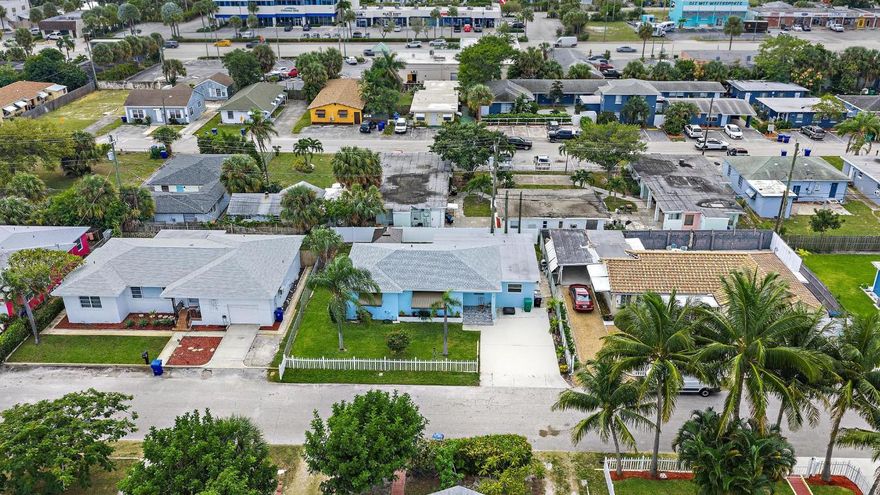 Beautifully remodeled 4-bedroom, 2-bath single-family home featuring modern upgrades and a newly enhanced backyard. Ideally located near Palm Beach Gardens Mall, Tanger Outlet, and just 10 minutes from I-95. Enjoy a 10-minute walk to Singer Island Beach and a quick 5-minute drive to several beachfront restaurants. The perfect blend of comfort, style, and coastal convenience!