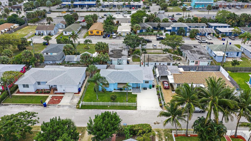 Photo of 135 E 28th Street, Riviera Beach, FL 33404 (MLS # R11141827)