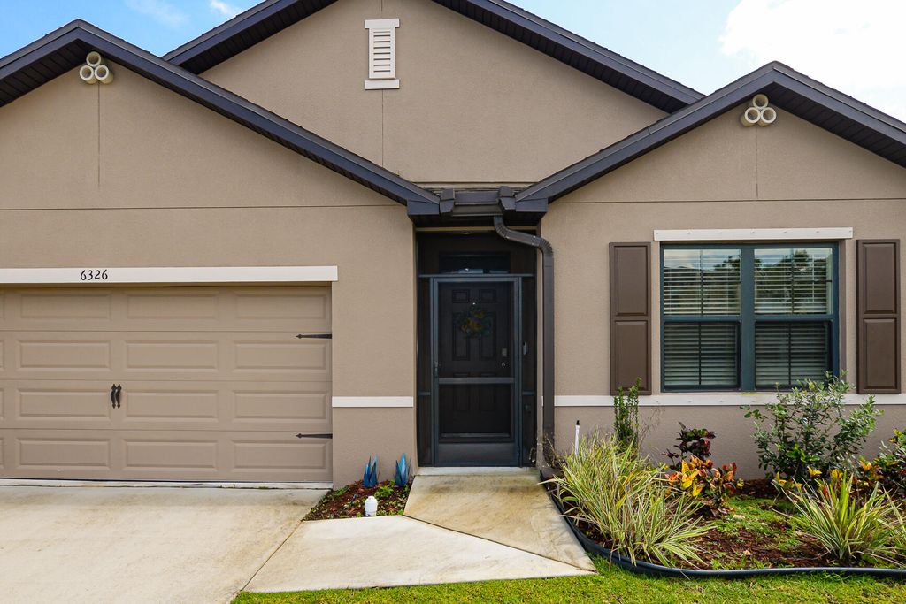 Photo of 6326 NW Northwood Loop, Port Saint Lucie, FL 34983 (MLS # R11096403)