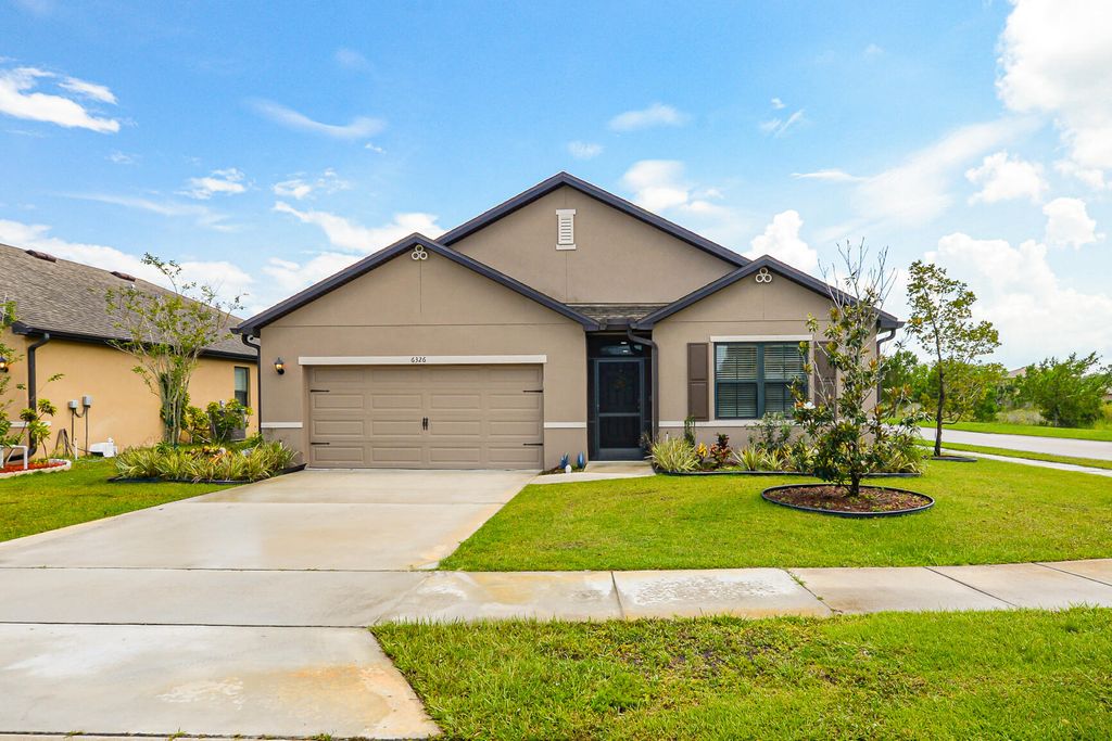 Photo of 6326 NW Northwood Loop, Port Saint Lucie, FL 34983 (MLS # R11096403)