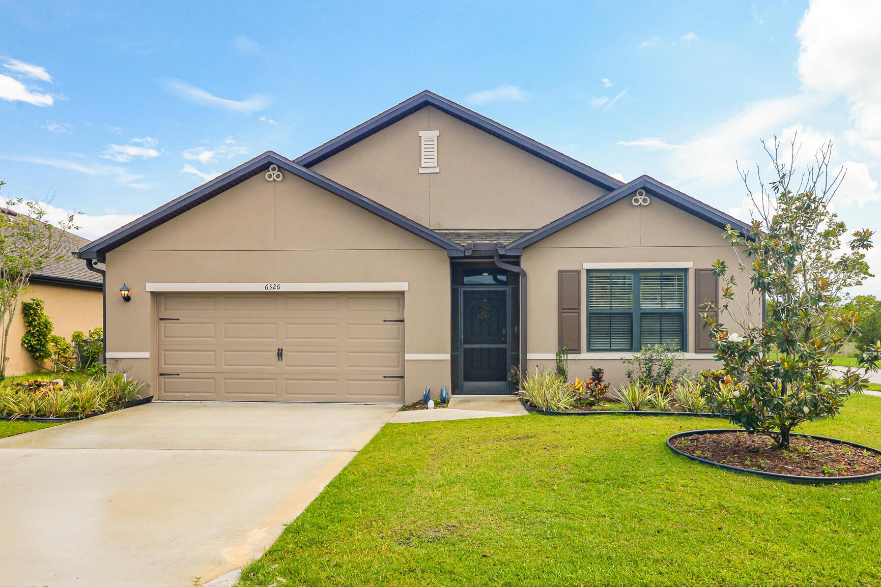 UPGRADES GALORE!! This beautiful D.R. Horton Cali Extended model is definitely a must see! 4 bedroom, 2 Bath, 2 car garage corner lot in the highly desired St. Andrews Preserve. Upgrades include 40 x 15 extended screened in patio with solid roof for entertaining. Kitchen has upgraded custom shelving in pantry, deep open sink and a must have refrigerator. LED lighting throughout. Electric remote control blinds. Whole house Rain Soft water filtration system. Solar panels for energy efficiency. Life proof flooring in Master bedroom and large walk in closet. Custom epoxy flooring in garage and patio. This is an amazing find! Close to shopping, schools, I-95, golf and beaches!