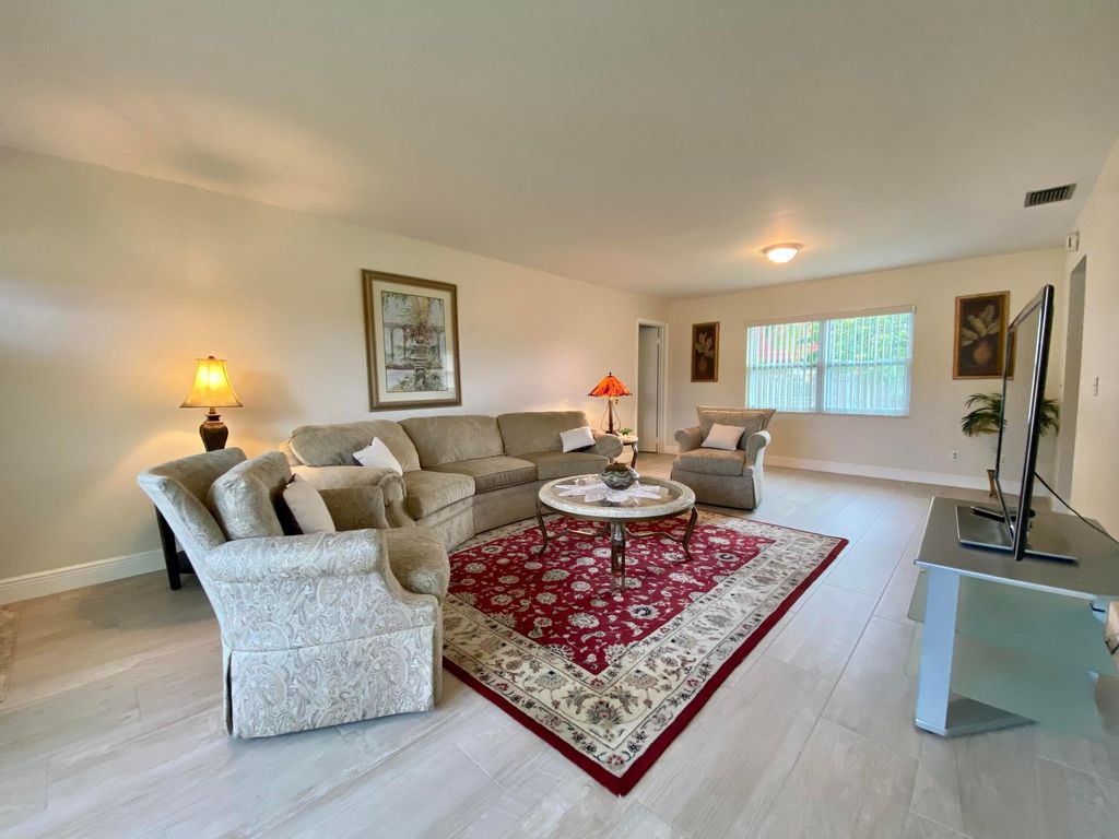 Photo of 1403 W Libby Drive, West Palm Beach, FL 33406 (MLS # R11062986)