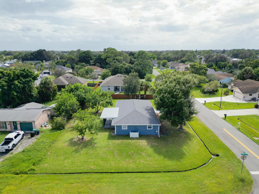 Photo of 1801 SW Beeker Street, Port Saint Lucie, FL 34953 (MLS # R11129266)