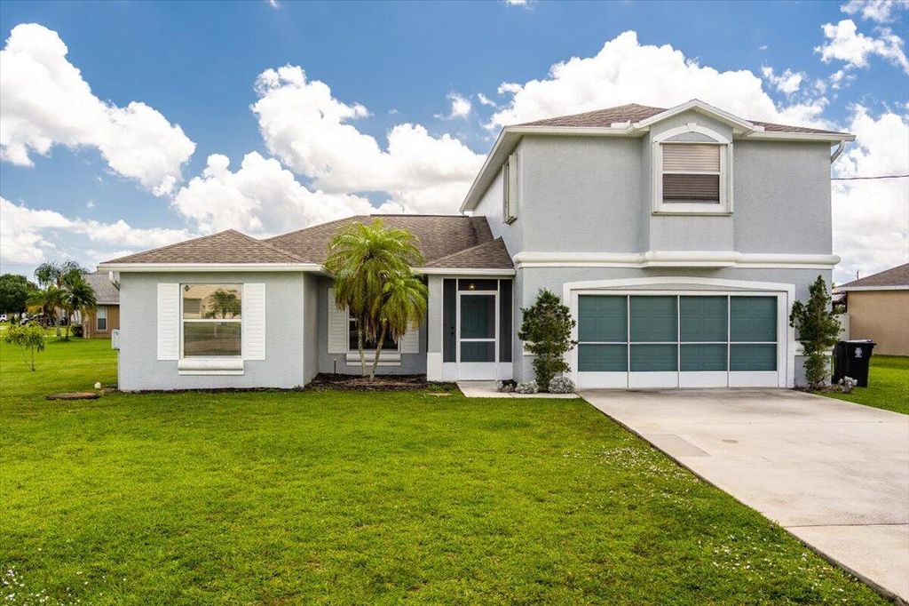 Photo of 5761 NW Cahaba Street, Port St Lucie, FL 34986 (MLS # R10896325)
