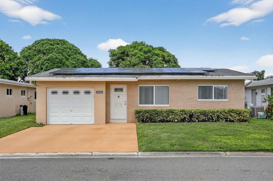 Charming Home in a 55+ Community - Fully Remodeled!  Two bedrooms, two bathrooms, and one car garage. It is equipped with solar panels installed on the roof, which can significantly reduce your electric bill. The home also has a ready-to-use electric car charging setup.
Enjoy clean, mineralized drinking water with a high-quality filtration system that includes three separate water outlets—for the kitchen sink, coffee maker, and refrigerator.
Located in the desirable Paradise Gardens Section III community, residents enjoy access to a beautiful clubhouse with a swimming pool, gym, and various other amenities. The community is ideally situated near Atlantic Blvd., State Road 7/U.S. 441, Lakewood Shopping Center, Margate Plaza, HCA Florida Northwest Hospital, and much more.