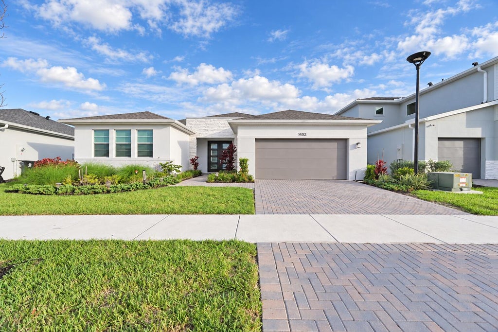Photo of 14252 Murney Way, Port Saint Lucie, FL 34987 (MLS # B26073002)