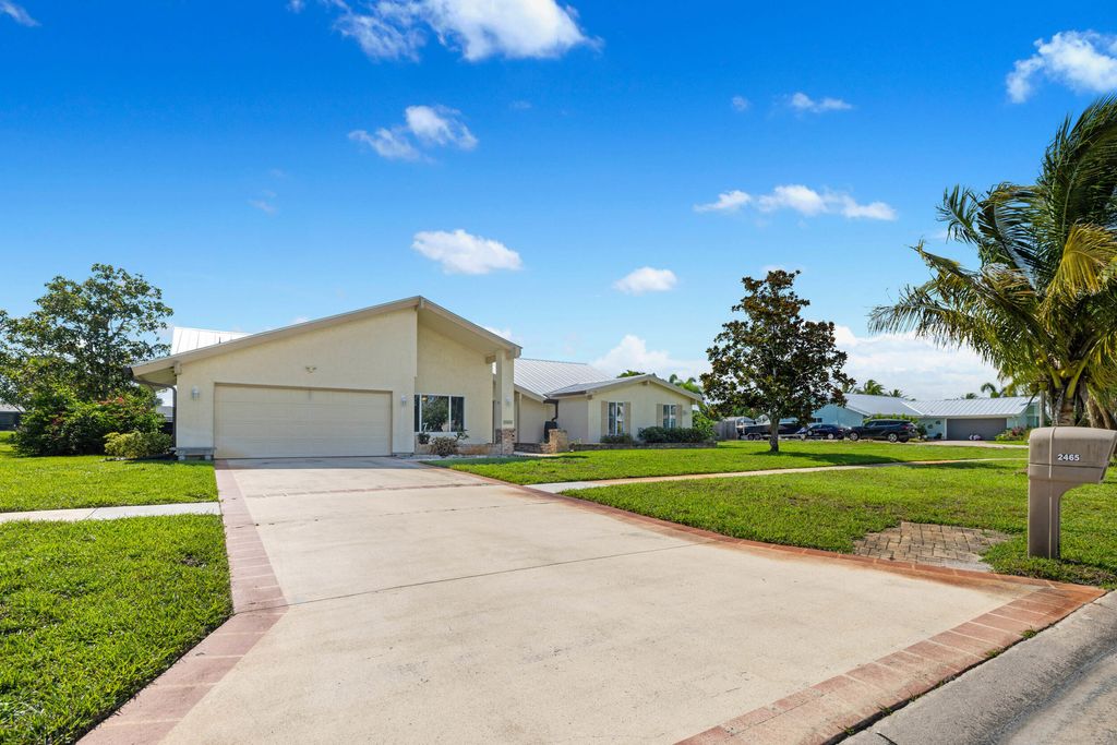 Photo of 2465 SE Gowin Drive, Port Saint Lucie, FL 34952 (MLS # R10997085)