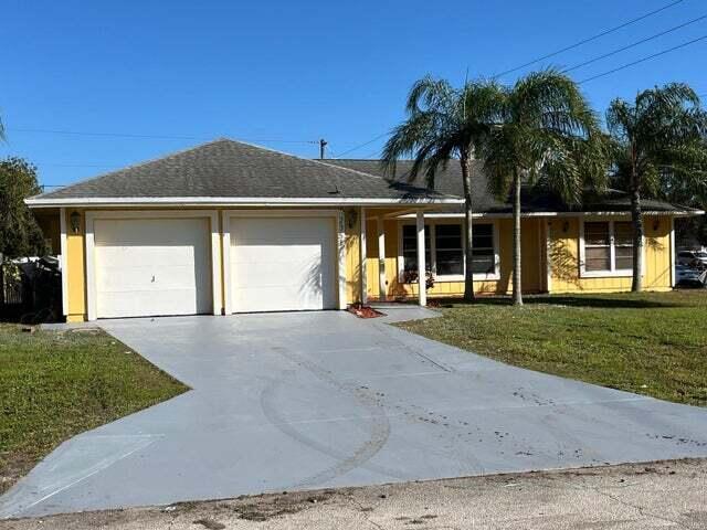 Spacious and well-kept 3-bedroom, 2-bath single-family home for rent in Port Saint Lucie. This 1,665 sq ft property features a split-bedroom layout, formal dining, large living room, and kitchen. Includes a 2-car garage and sits on a large lot with no HOA. Located near schools, shops, and major roads. No pets allowed.