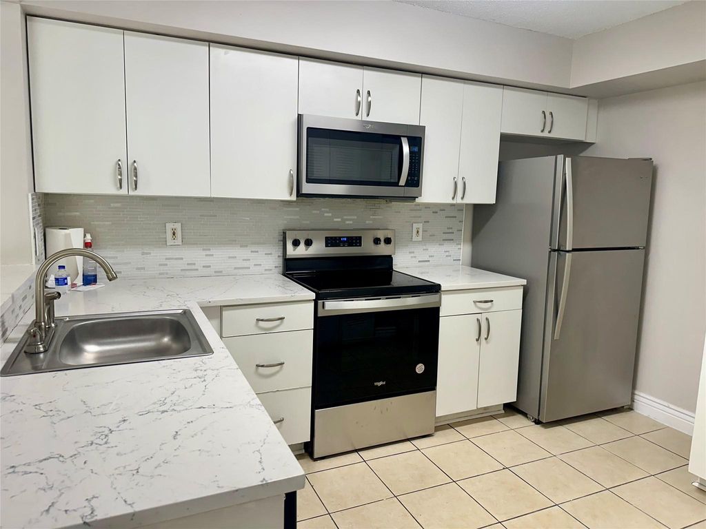 Photo of 5701 Riverside Drive #205, Pompano Beach, FL 33067 (MLS # F10505010)