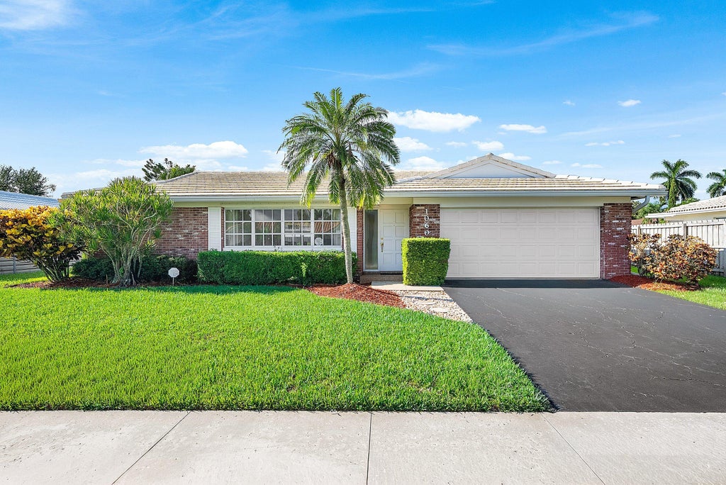 Photo of 1060 NW 9th Street, Boca Raton, FL 33486 (MLS # B26073634)