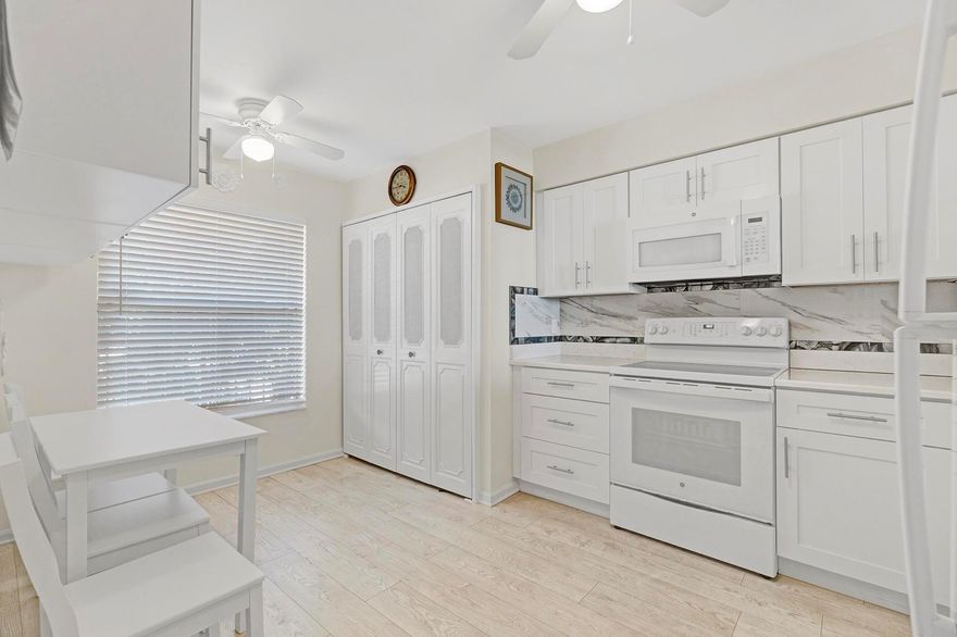 Beautiful, light, bright condo home in pretty Bonaire. Fully remodeled 2 bedrooms and 2 baths WATER view with large balcony. Great closet space in both bedrooms with walk-in closet and water view in primary. AND can be fully furnished! Large remodeled eat-in kitchen with pretty backsplash, countertops and cabinets, and new in-unit stackable full-size Washer/Dryer and new tankless hot water heater. You'll love the large lakeview balcony complete with porch swing and accordion shutters! Bonaire is well-run and has completed all inspections! Take a dip by the community pool just one building away, or get fit at the gym! Bluestream cable w/ DVR and wifi router, water, sewer, garbage incl. On-site management. Maint fees just reduced too!