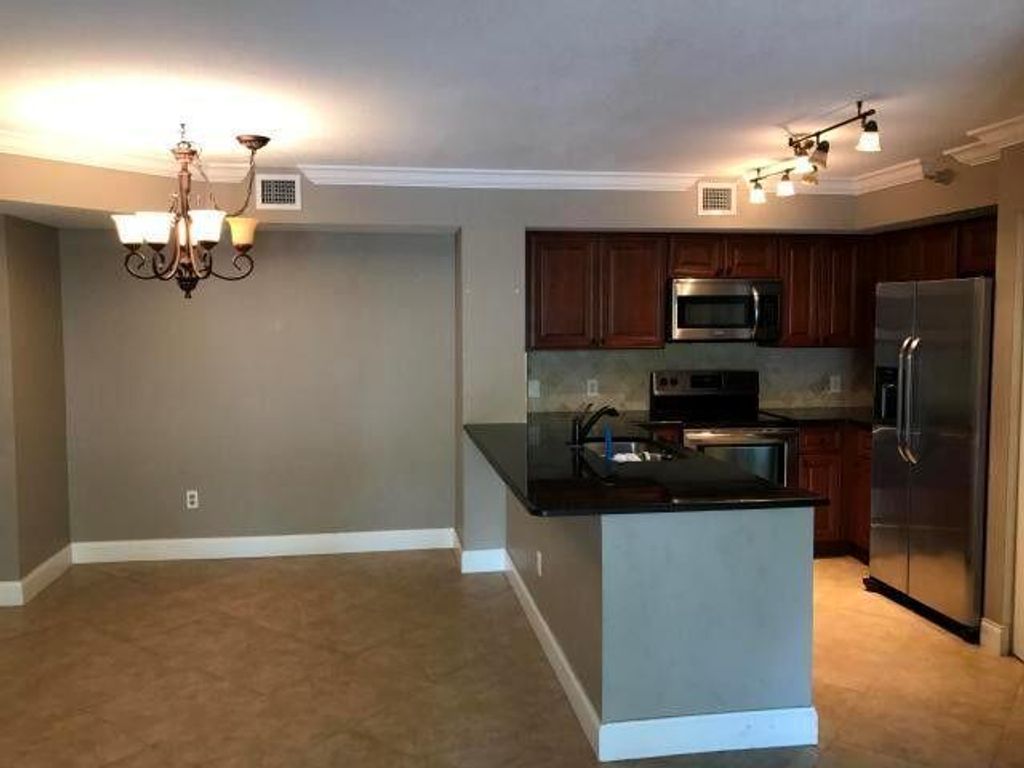 Photo of 110 Yacht Club Way #205, Hypoluxo, FL 33462 (MLS # R11093919)