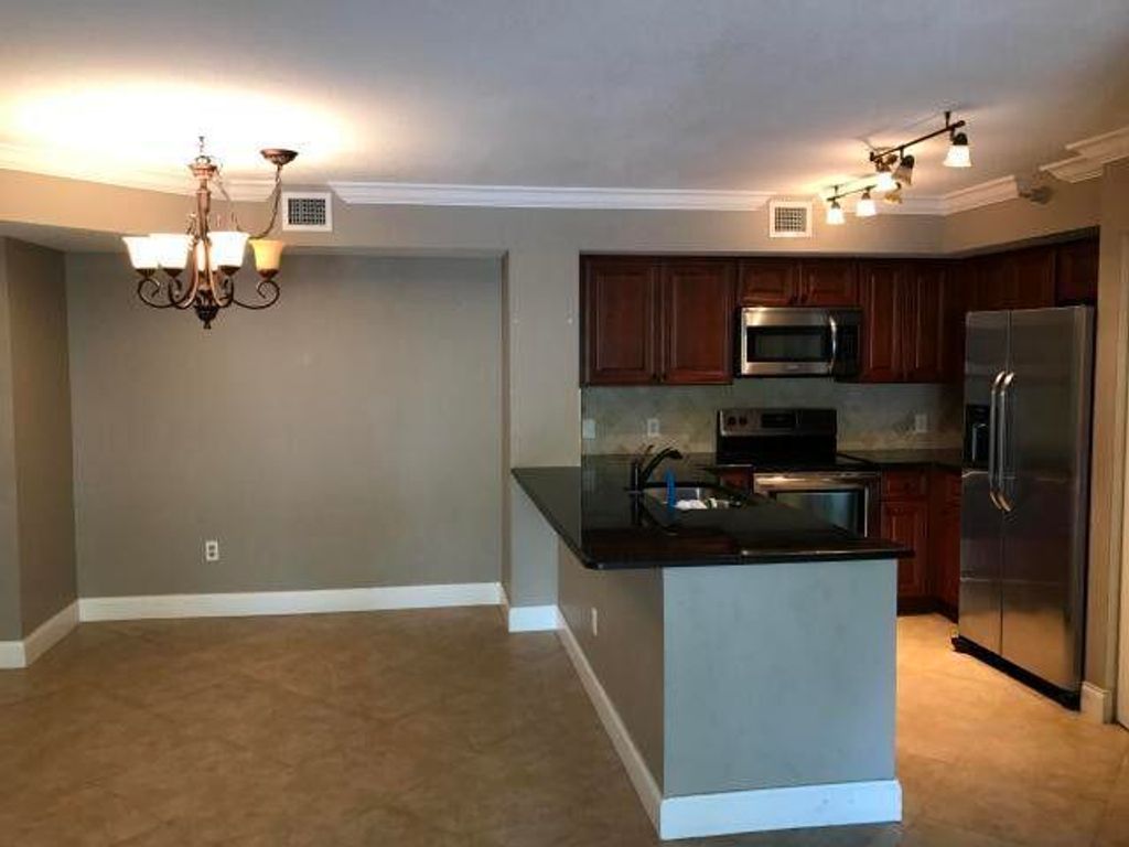 Photo of 110 Yacht Club Way #205, Hypoluxo, FL 33462 (MLS # R11093919)