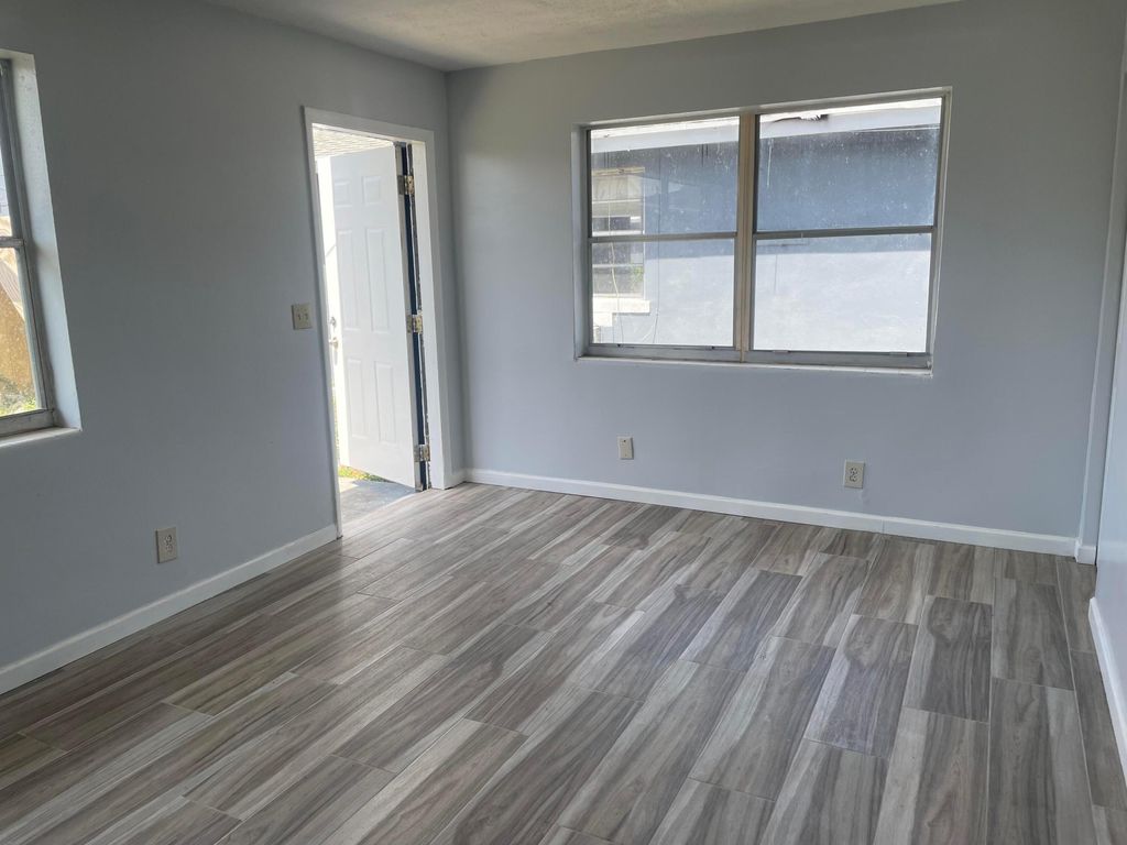 Photo of 111 E 27th St. St #113b, Riviera Beach, FL 33404 (MLS # B26022974)