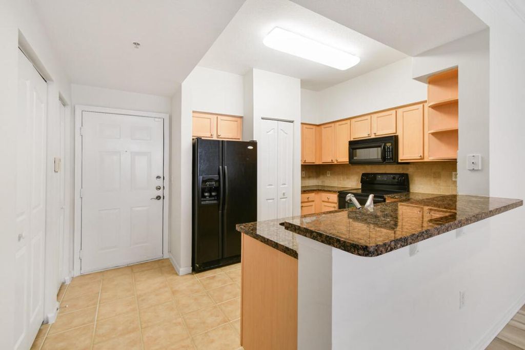 Photo of 275 Murcia Drive #204, Jupiter, FL 33458 (MLS # R10982896)
