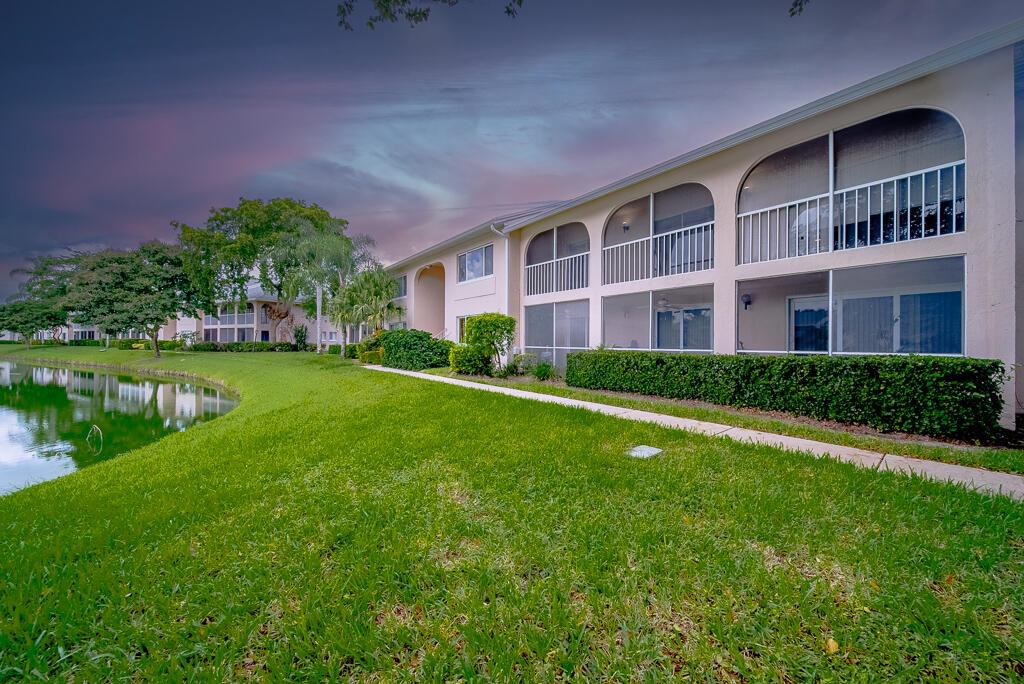 Completely updated lakefront condo in Pine Ridge at Delray Beach, close to many shopping centers, restaurants and entertaining! This beautiful second floor unit boasts THREE bedrooms, 2 bathrooms, vaulted ceilings, a fully renovated kitchen with waterfall quartz countertops, stainless steel appliances, beverage cooler, and skylight. This home blends style and comfort effortlessly. Gorgeous porcelain floors flow throughout, adding a sleek and modern touch. All bedrooms open to the screened balcony, perfect for relaxing while overlooking the tranquil lake. The master bedroom suite is a true retreat, complete with a walk-in closet and spacious bathroom where you will find a large tub and step-in shower.