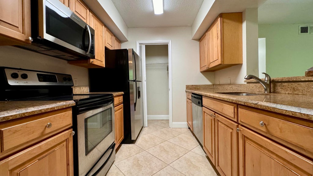 Photo of 815 W Boynton Beach Boulevard #10-105, Boynton Beach, FL 33426 (MLS # B26046920)