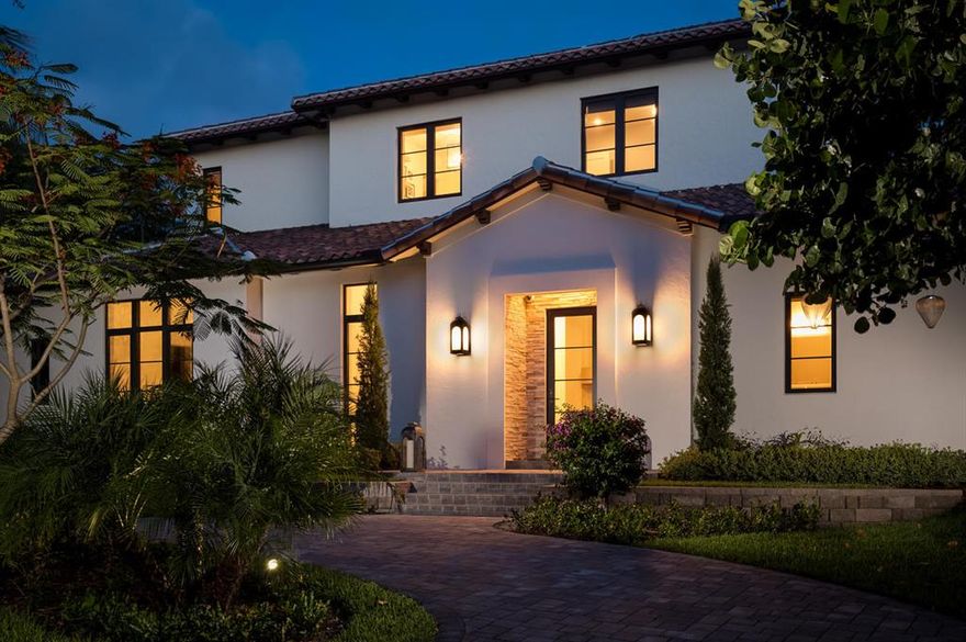 A rare opportunity to own a Contemporary Mediterranean home custom built by Marc Julien Homes and designed by Randall Stofft Architects. Located in the North beach section of Delray Beach, the home is situated on a quiet, dead end street. Tucked away in an overgrown corner lot the house enjoys extraordinary privacy while only 1 block from the beach and walking distance to Atlantic Avenue. Features include a formal living room with picturesque views of the pool and bougainvilleas, a chef's kitchen open to the family room with a Butler's pantry and a dining /playroom. There are 4 bedrooms in the main house- 1 guest suite downstairs and a master suite with two bedrooms upstairs.  An attached guesthouse with a separate entrance can be used as an office or an in-law suite.