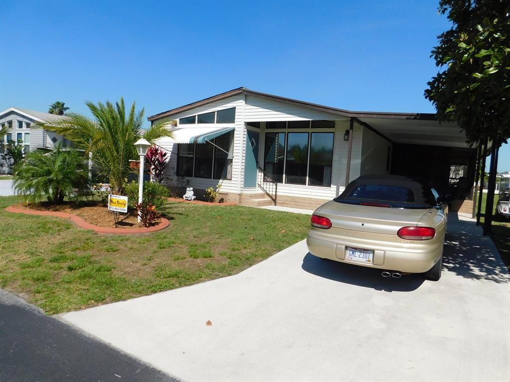 Photo of 527 Tropical Isles Circle, Fort Pierce, FL 34982 (MLS # R10697915)