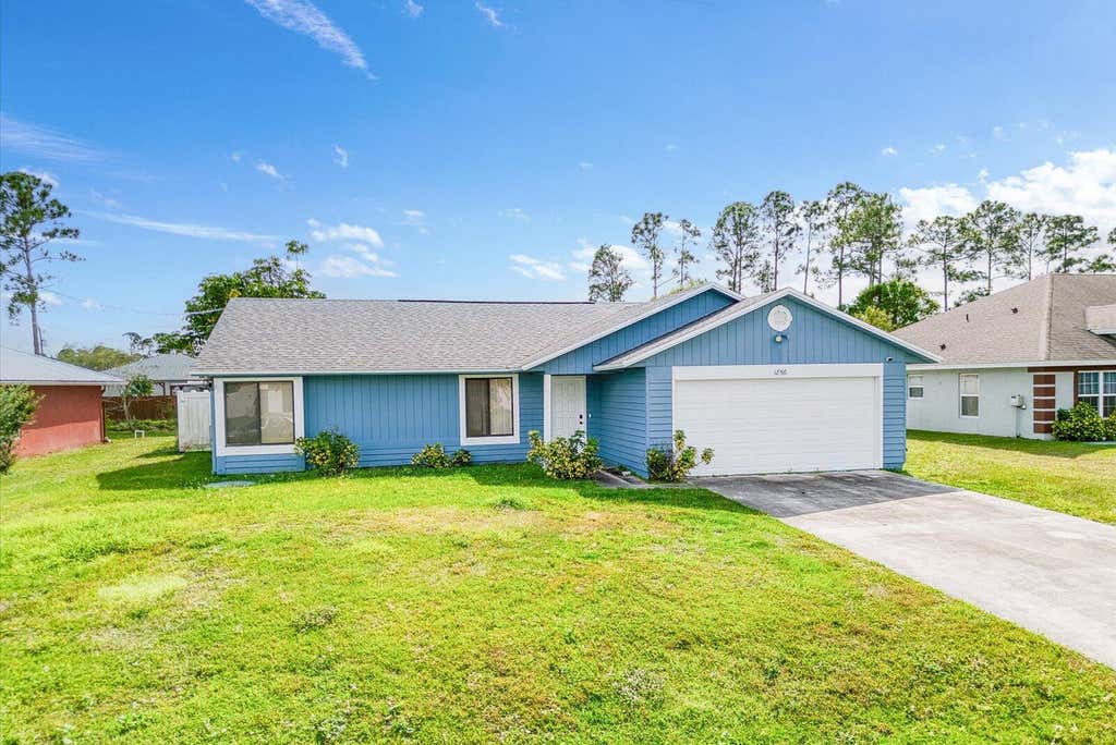 Photo of 1856 SW Millikin Avenue, Port Saint Lucie, FL 34953 (MLS # R11057805)