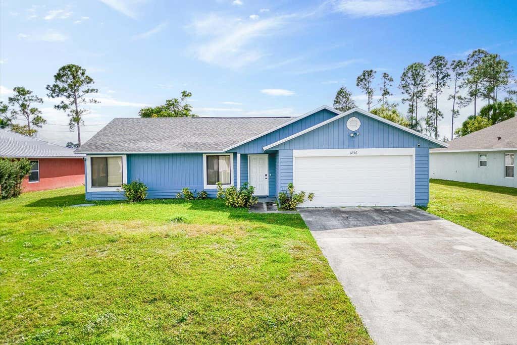 Photo of 1856 SW Millikin Avenue, Port Saint Lucie, FL 34953 (MLS # R11057805)