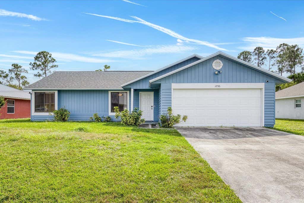 Photo of 1856 SW Millikin Avenue, Port Saint Lucie, FL 34953 (MLS # R11057805)