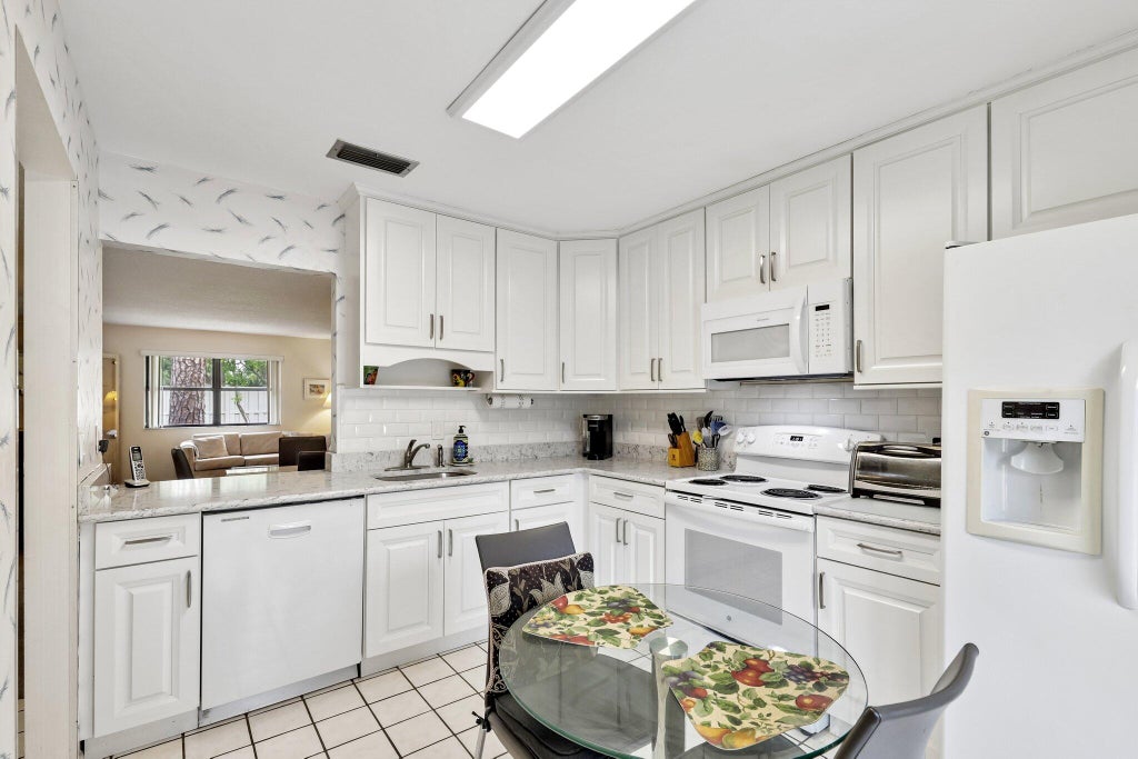 Photo of 157 Pinto Palm Court, Royal Palm Beach, FL 33411 (MLS # B26038687)
