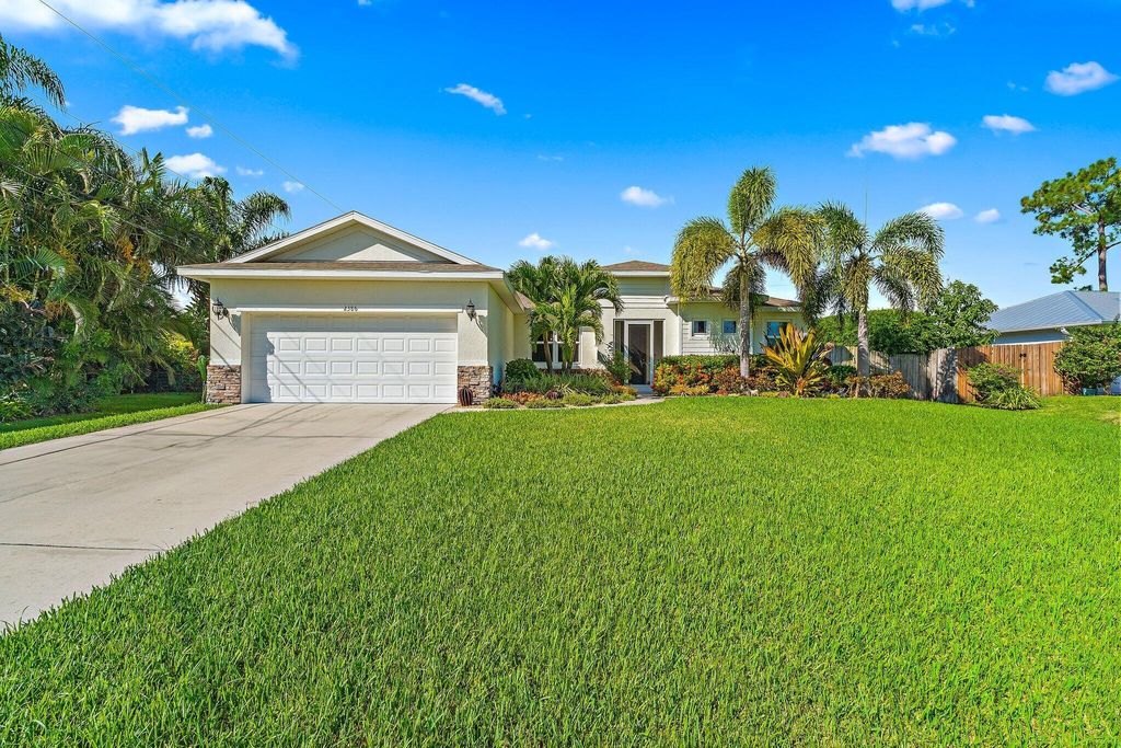 Photo of 2386 SW Madrid Road, Port Saint Lucie, FL 34953 (MLS # R11124368)