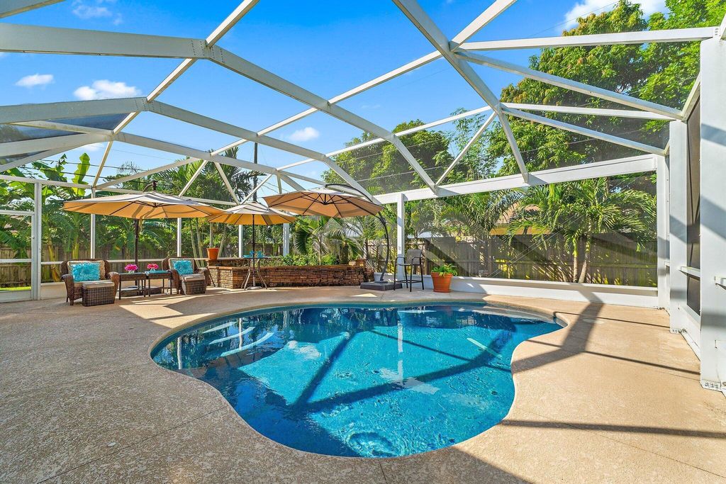 Photo of 2386 SW Madrid Road, Port Saint Lucie, FL 34953 (MLS # R11124368)