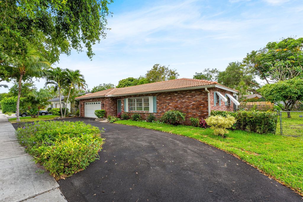 Photo of 931 NW 9th Court, Boca Raton, FL 33486 (MLS # B26011485)